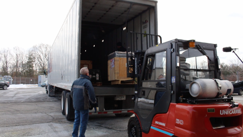 EHT data from the SPT unloaded from a FedEx truck